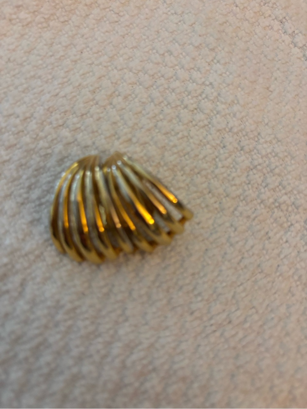 Gold clip on earring